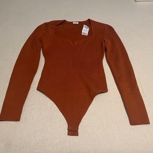 Abercrombie & Fitch orange body suit in size small